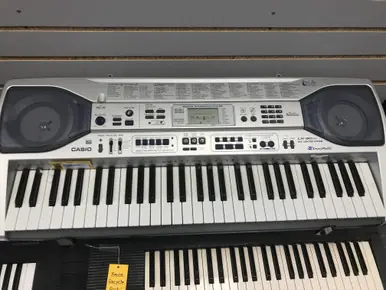 Used Casio LK-90TV 61-Key Keyboard 61-Key Crafted